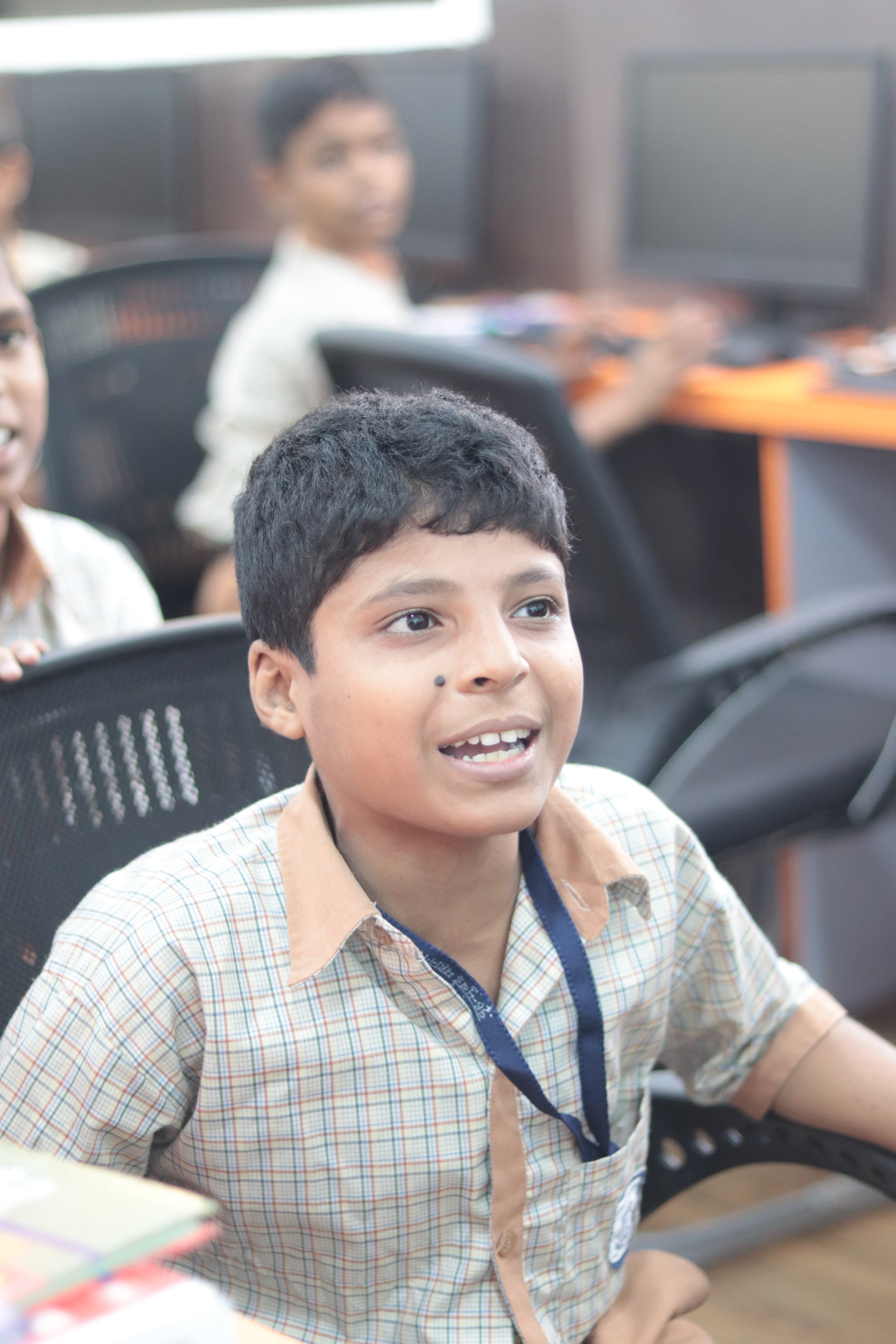 Children learning digital skills in computer lab